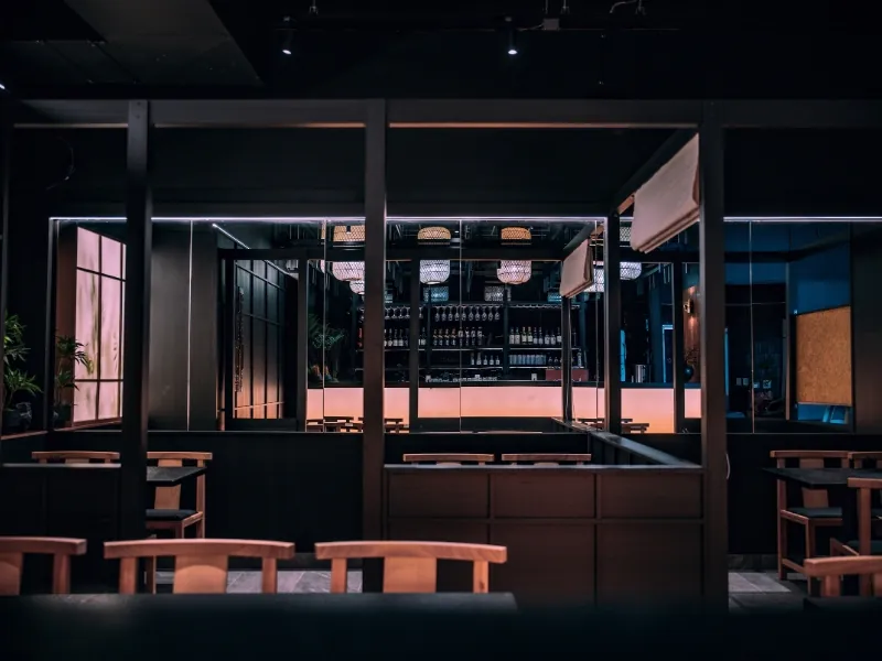 Private dining booth with a view of the bar at Kanpai Ramen, a Ramen Restaurant in New Port Richey
